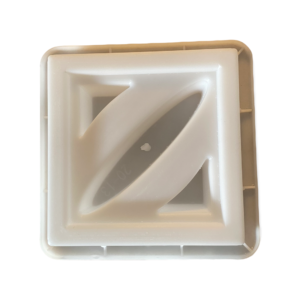 Lunar breeze block mold by Pacific Mold Design showing cast beige concrete block with moon phase inspired geometric pattern for modern mid-century decorative garden walls and architectural screens